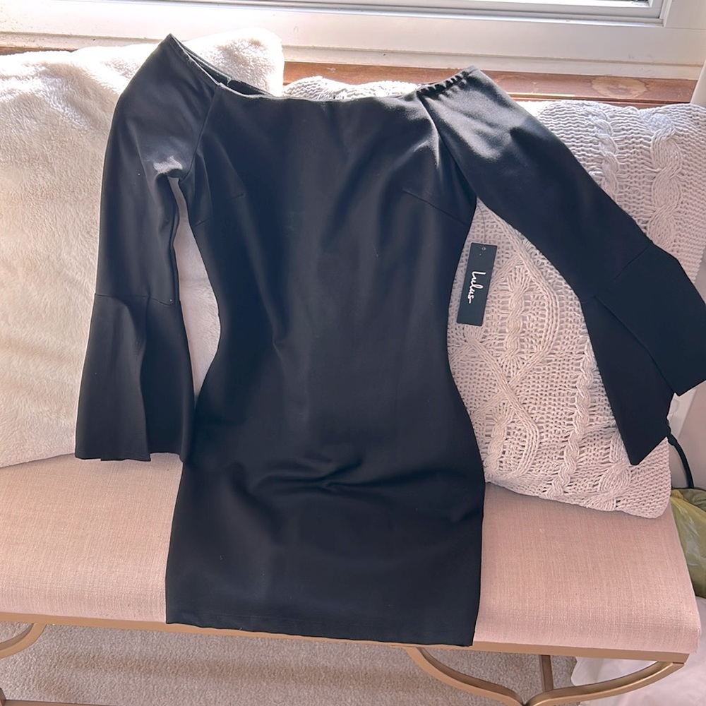 Black mini dress, flared arms ,off the shoulder